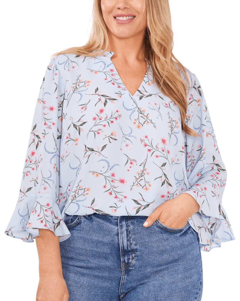 Front of a model wearing a size 1X Violet Ruffle V-Neck Blouse in OCEAN SPRAY by CeCe. | dia_product_style_image_id:263807